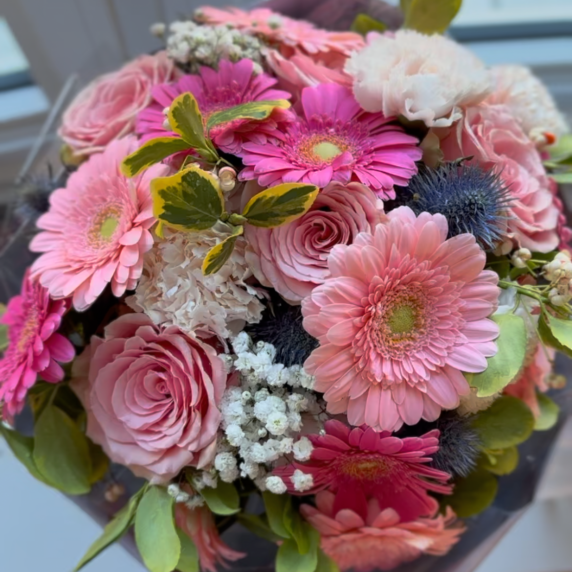 Vibrant Pink Gerbera and Roses Arrangement