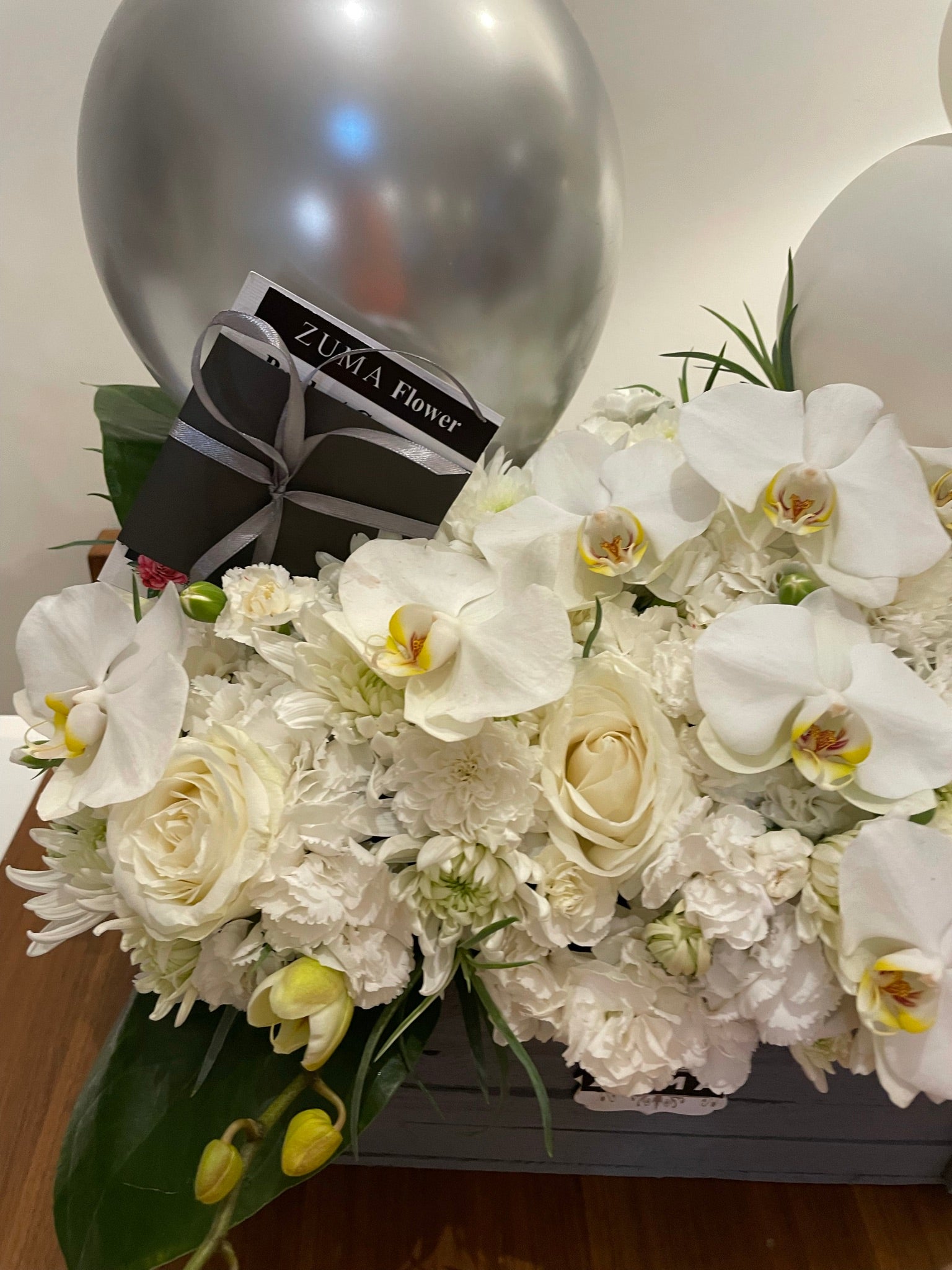 White Orchid Grandeur with Balloon Décor